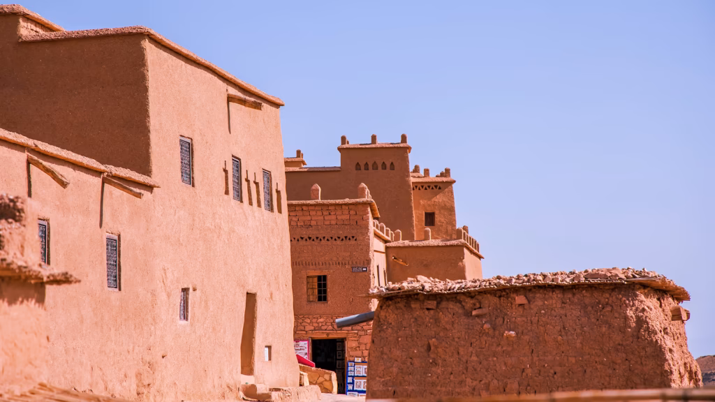 Mud-brick walls and towers of the Ait Benhaddou kasbah on day 1 of the Marrakech to Fes desert tour